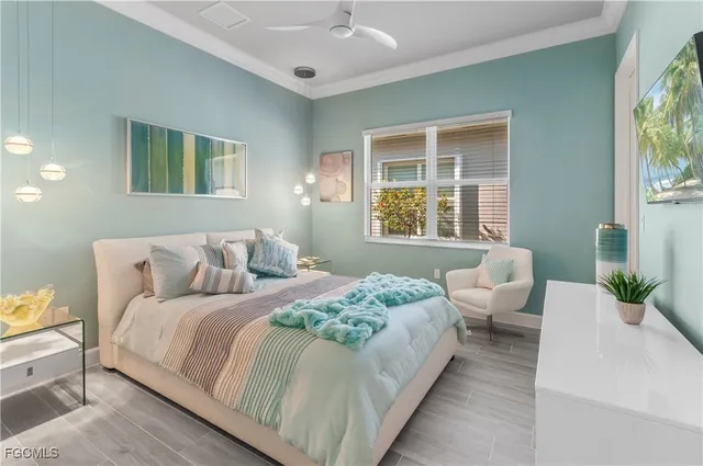 a view of a swimming pool with a garden and lake view