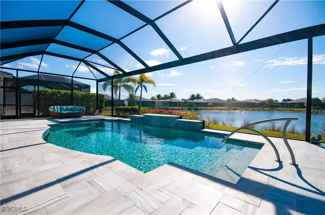 an aerial view of house with yard