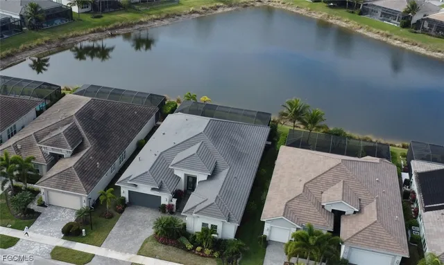 a view of a house with a flower garden