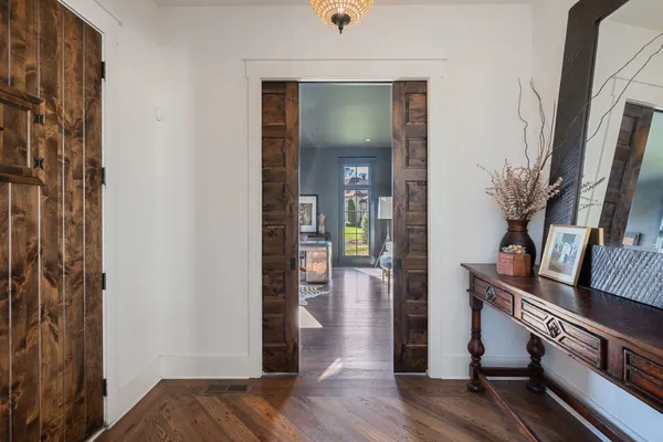 a view of a hallway with a white walls
