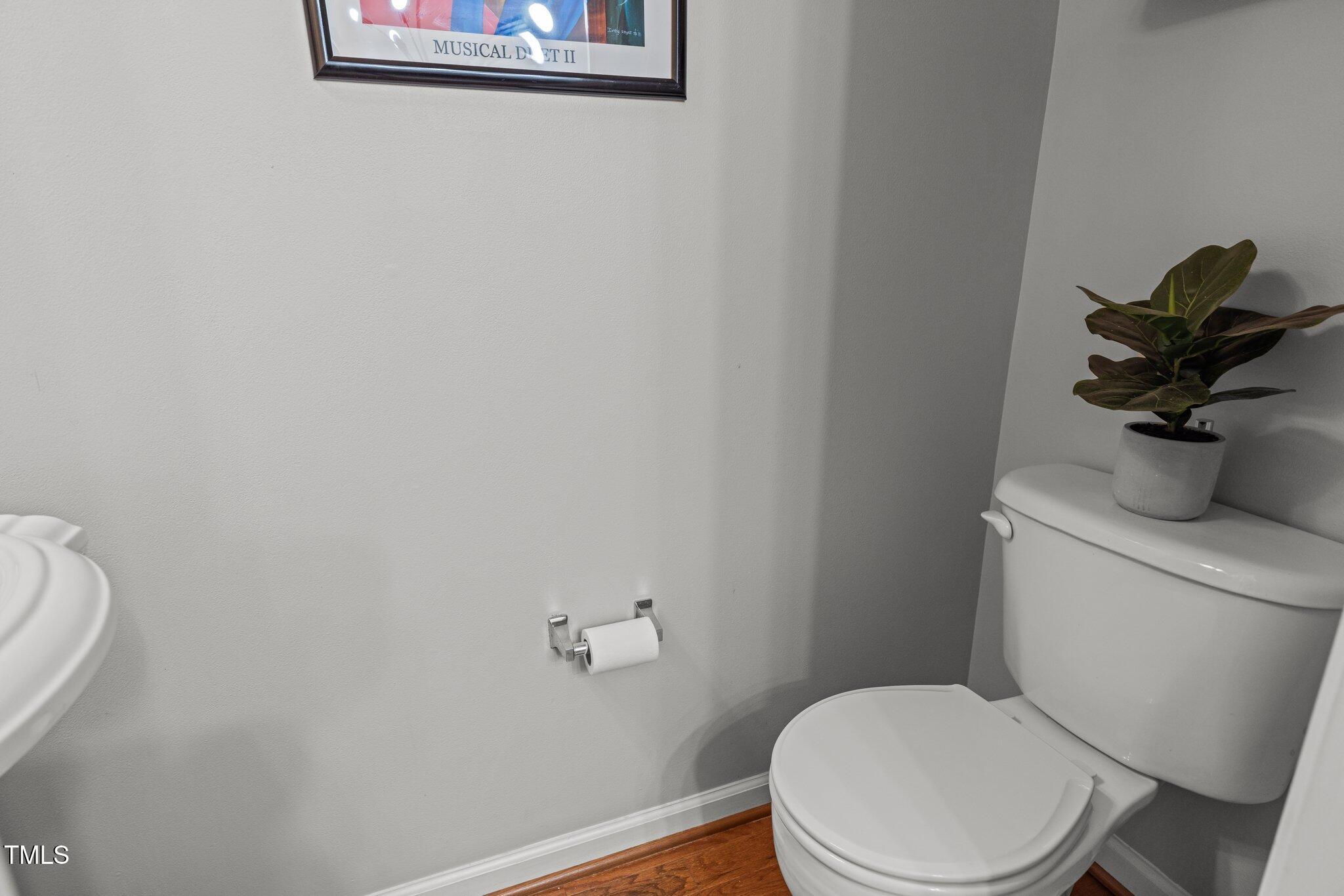 1667 Snow Mass Way Durham, NC 27713 - Photo 14 of 33 a white toilet sitting next to a shower