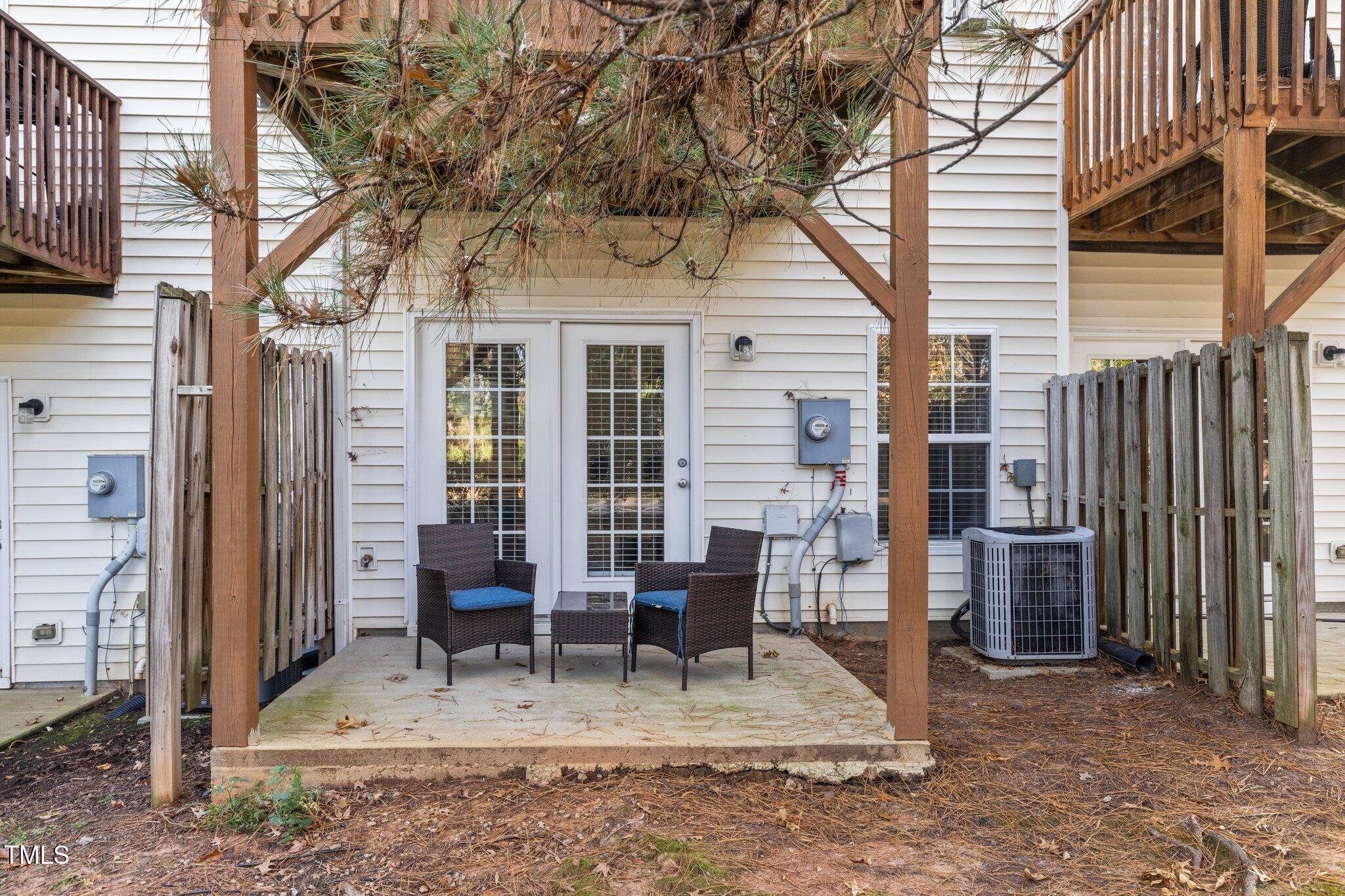 1667 Snow Mass Way Durham, NC 27713 - Photo 27 of 33 a view of a house with a patio and a yard