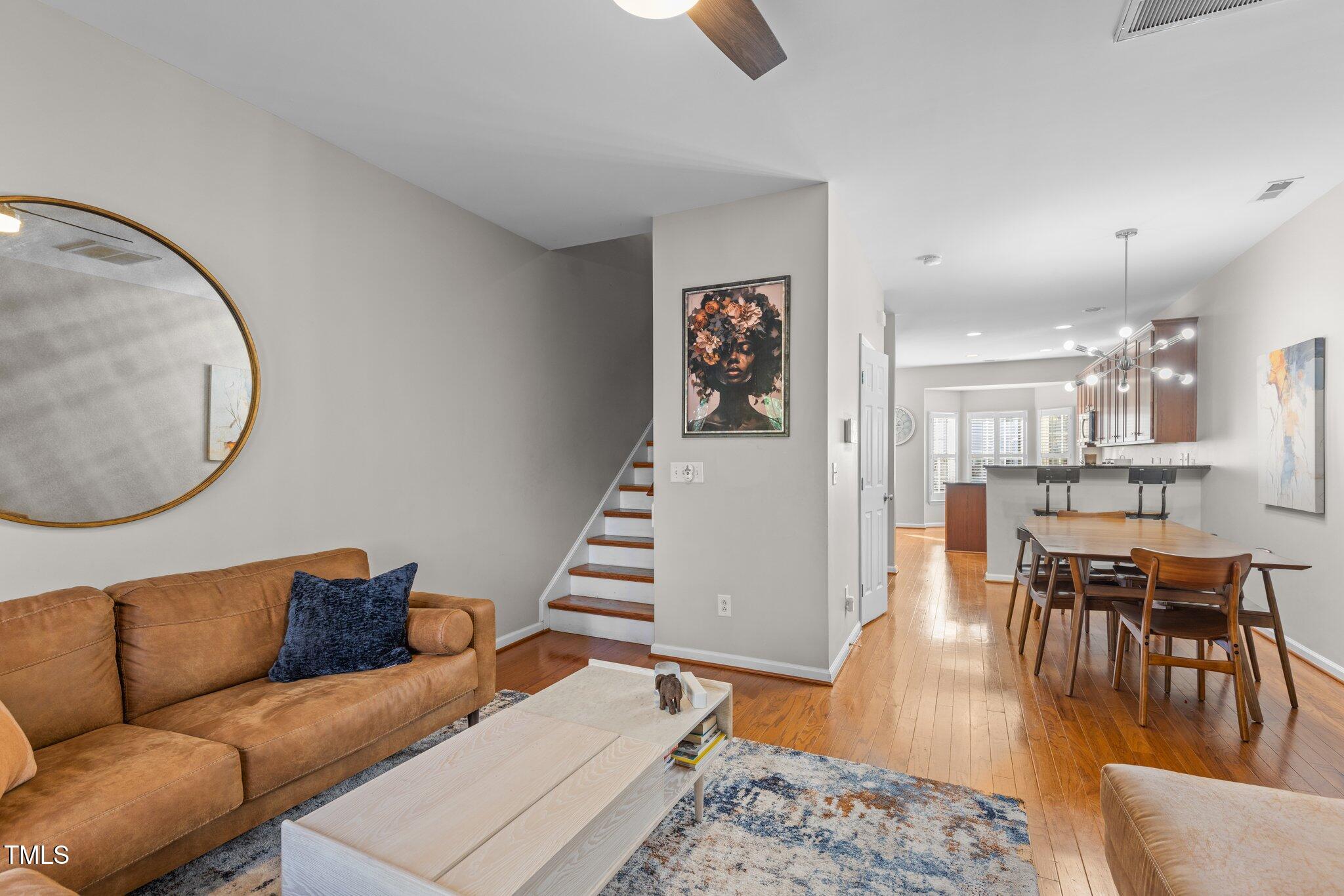 1667 Snow Mass Way Durham, NC 27713 - Photo 5 of 33 a living room with furniture and wooden floor