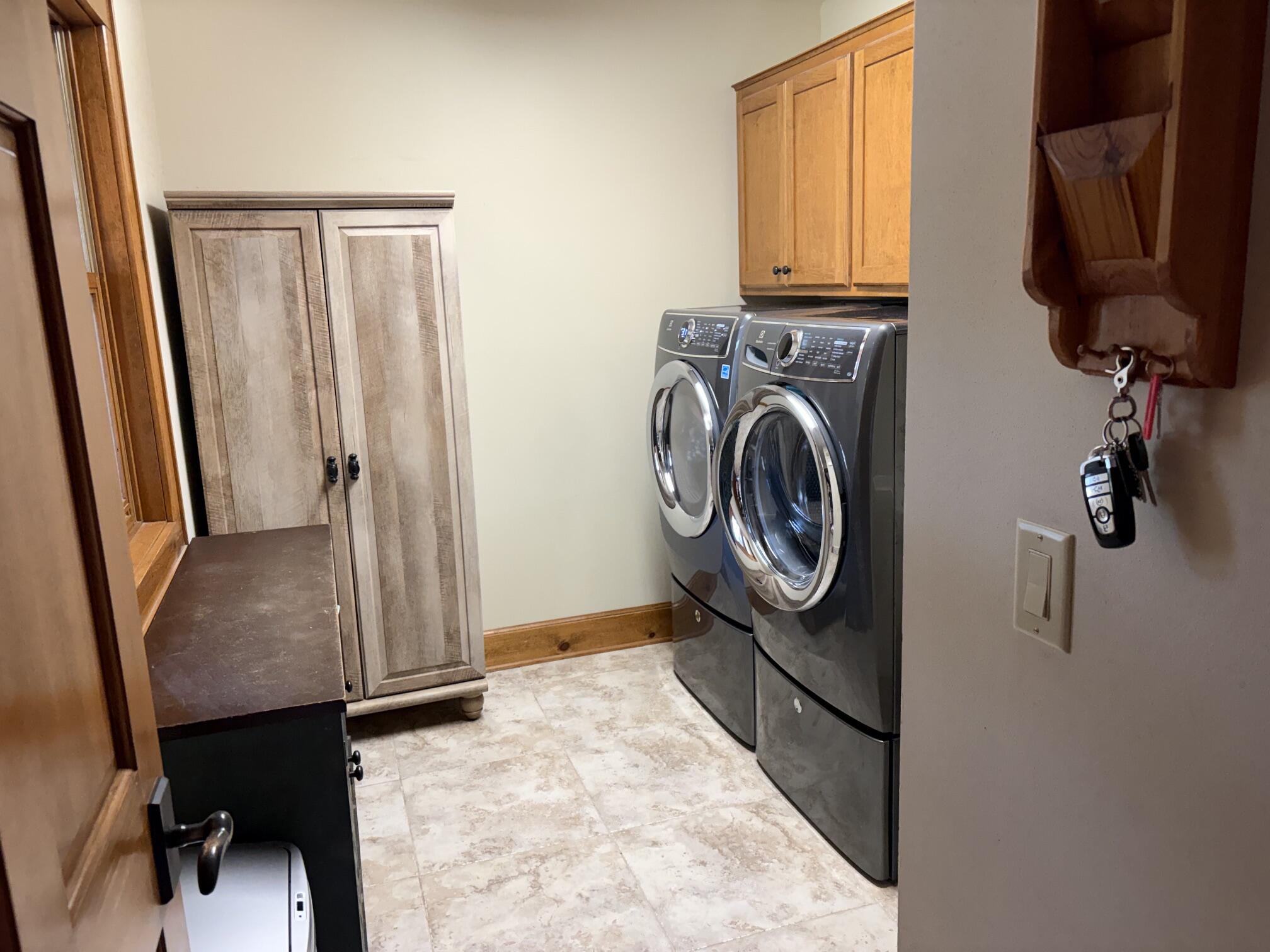 W376S4887 East Pretty Lake Road Ottawa, WI 53118 - Photo 29 of 61 Laundry/Mudroom on Main Floor