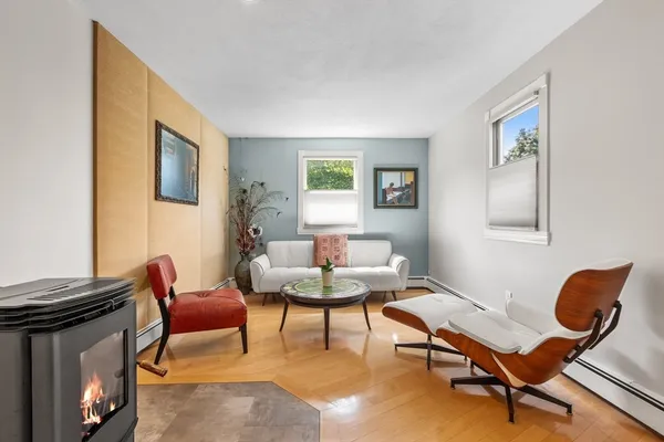 a living room with furniture and a window