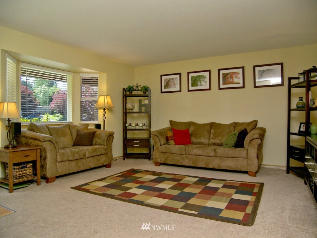 1496 Roma Road Bellingham, WA 98226 - Photo 2 of 14 a living room with furniture and a rug