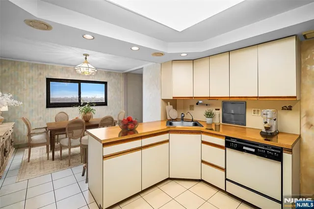 a large bedroom with a large bed and a large window