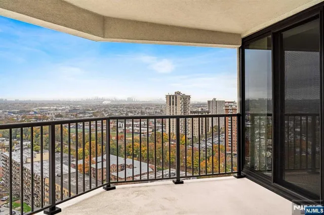 a view of balcony with city