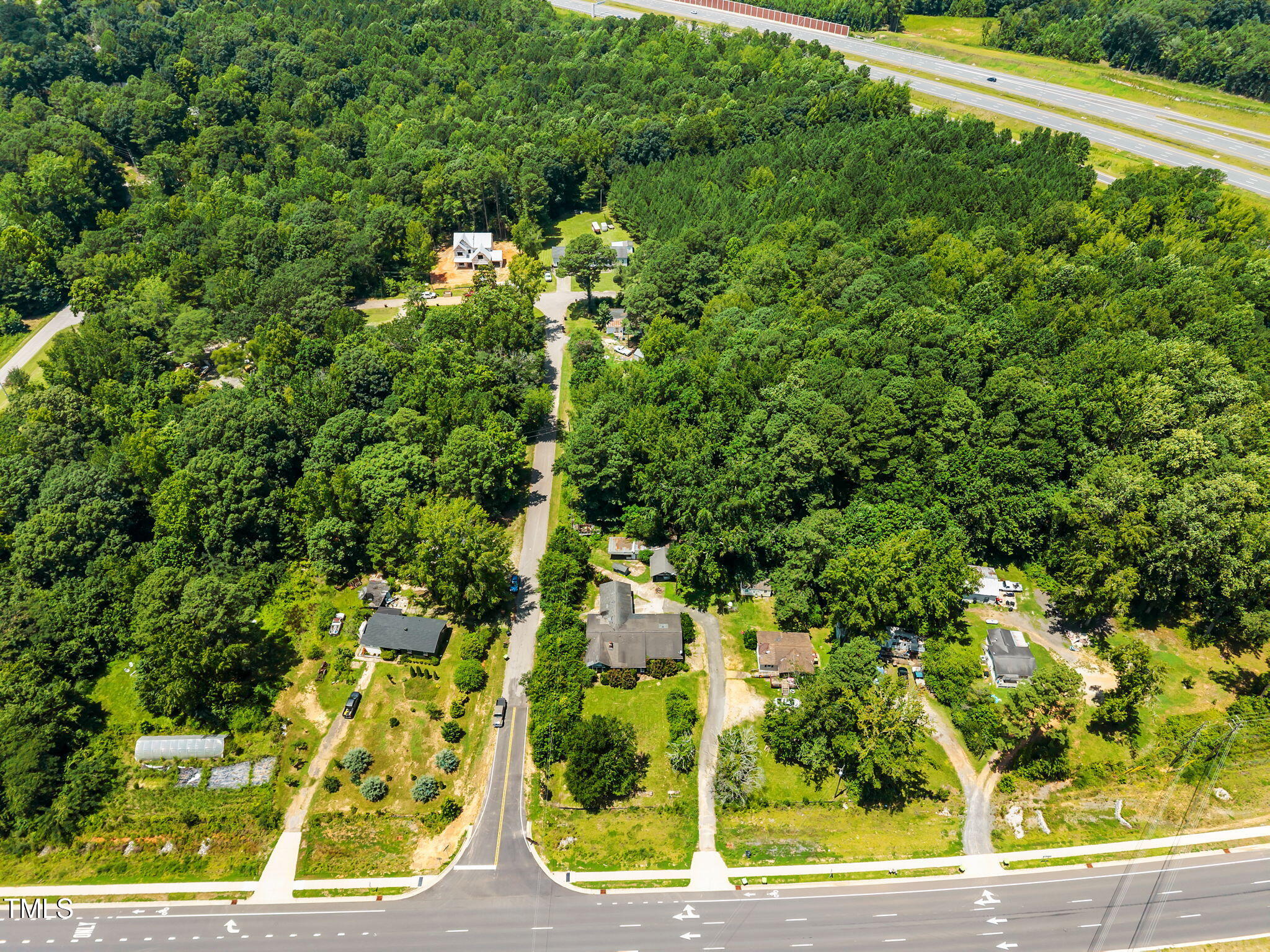 9640 Holly Springs Road Apex, NC 27539 - Photo 25 of 27 27-web-or-mls-DJI_20250717132404_0835_D