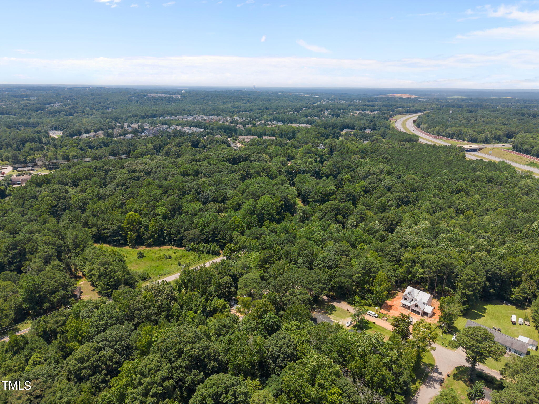 9640 Holly Springs Road Apex, NC 27539 - Photo 8 of 27 8-web-or-mls-DJI_20250717132318_0834_D-2