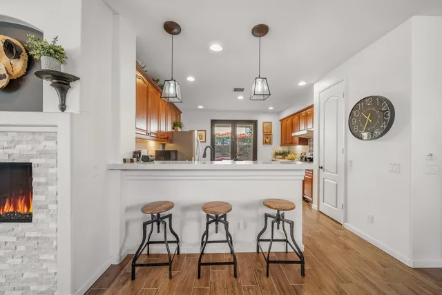 a bedroom with a bed and a flat tv screen