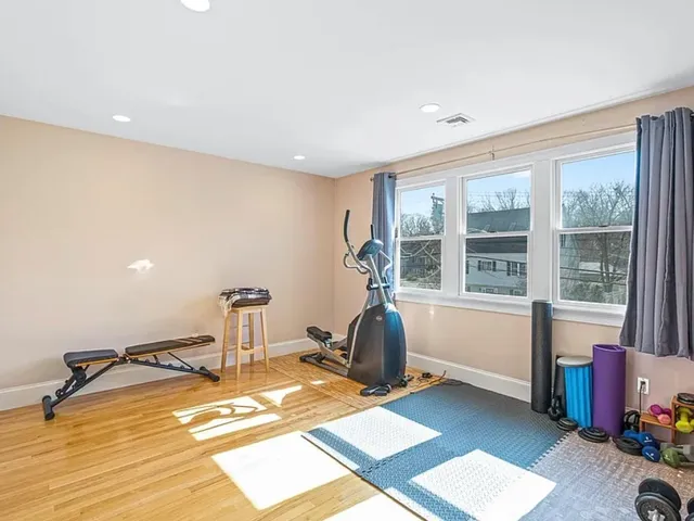 a view of a room with gym equipment