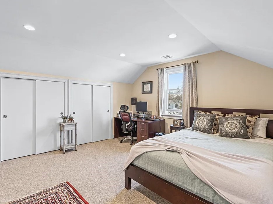 58 Spiers Road Newton, MA 02459 - Photo 15 of 21 a bedroom with a large bed and a large window