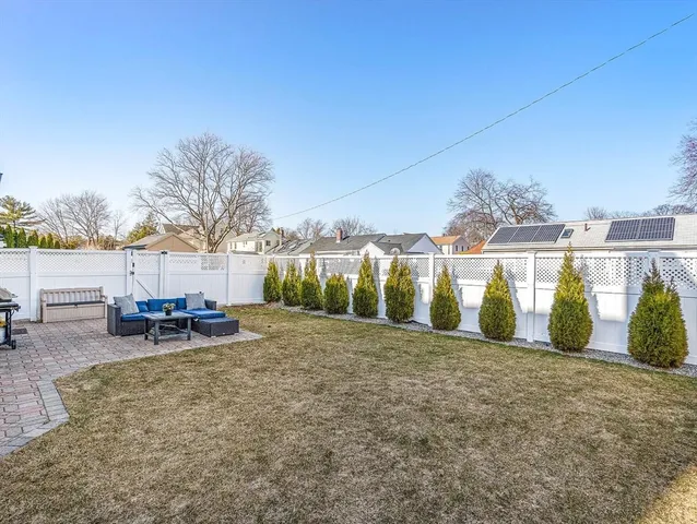 a view of a chairs and tables in the patio