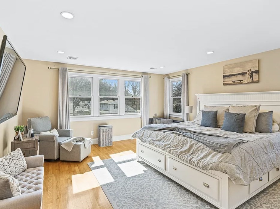 58 Spiers Road Newton, MA 02459 - Photo 9 of 21 a spacious bedroom with a bed and glass window