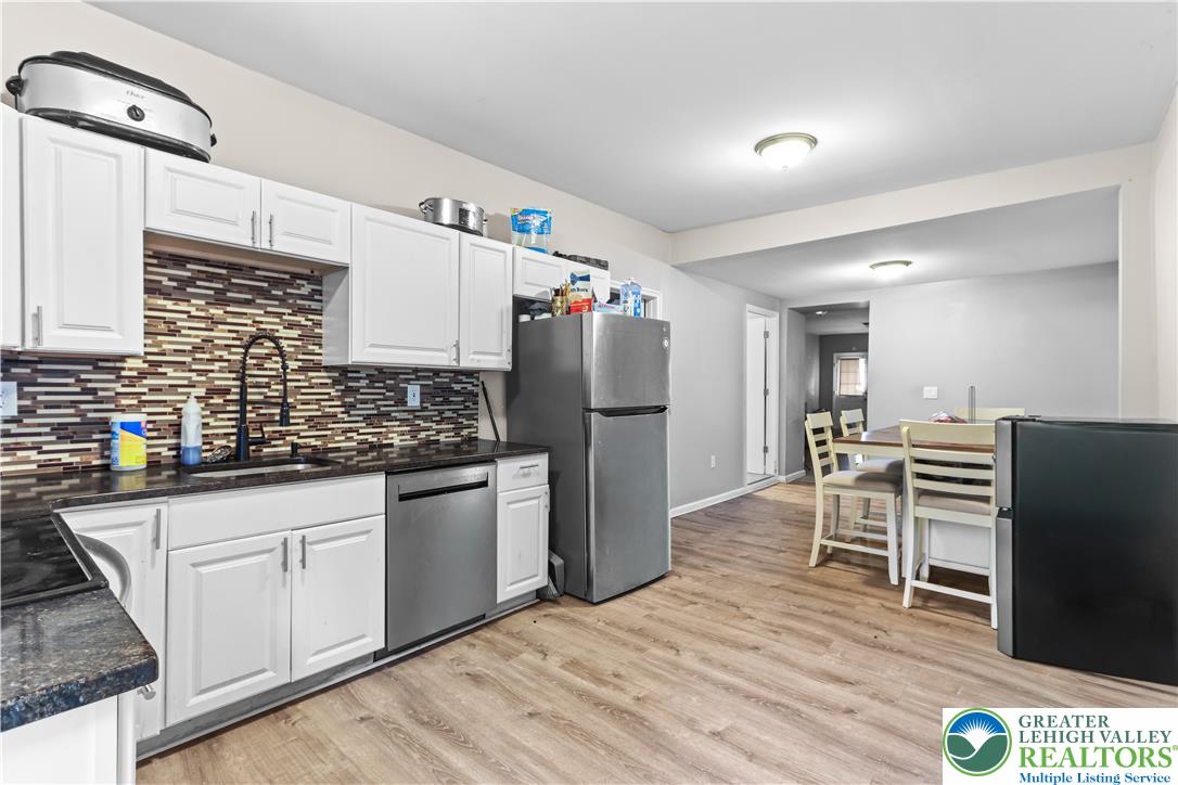 12 South Front Street Coplay, PA 18037 - Photo 24 of 41 This efficient kitchen offers ample space for culinary endeavors and everyday dining.