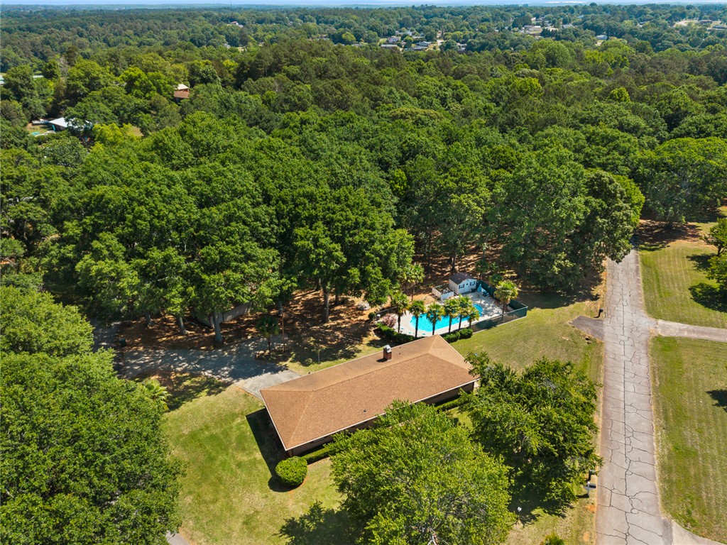2101 Old Spring Drive Anderson, SC 29625 - Photo 31 of 36 Discover a private woodland retreat featuring a sparkling swimming pool.