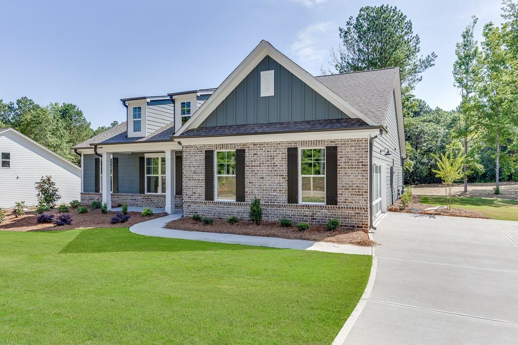 2099 Nunnally Farm Road Monroe, GA 30655 - Photo 1 of 1 a front view of house with yard and green space