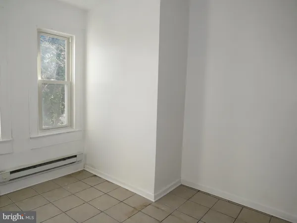 a view of an empty room with window
