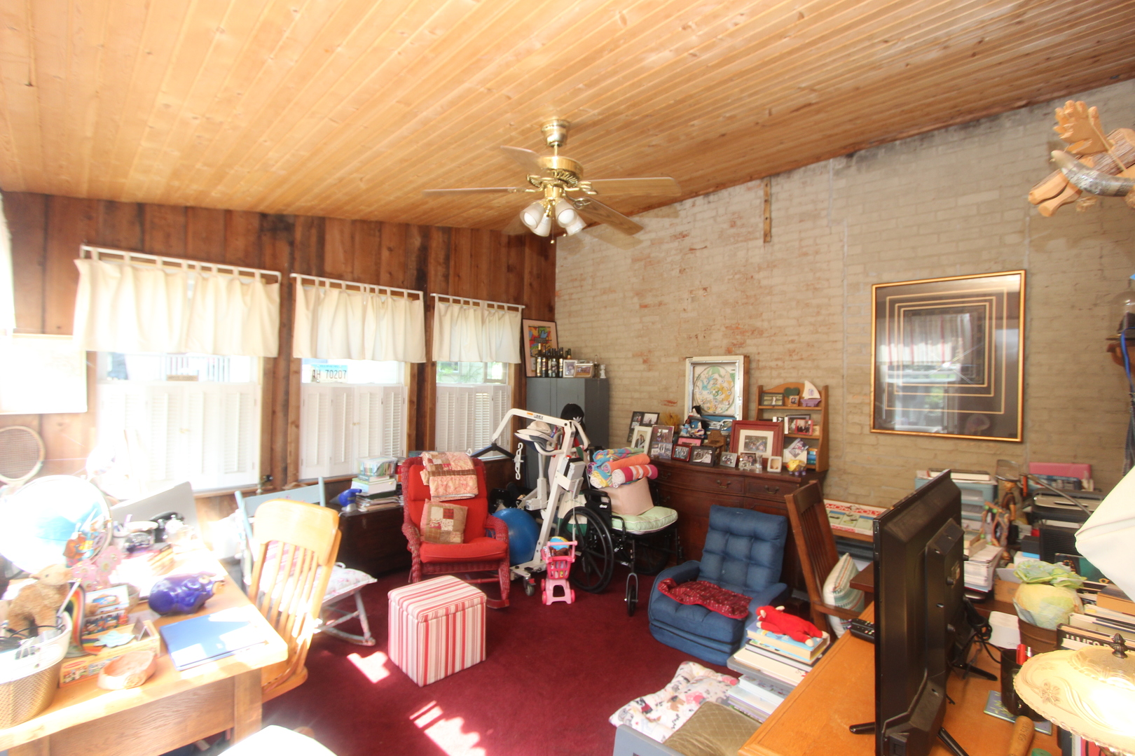 517 Dean Street Woodstock, IL 60098 - Photo 11 of 21 a living room with furniture and a large window