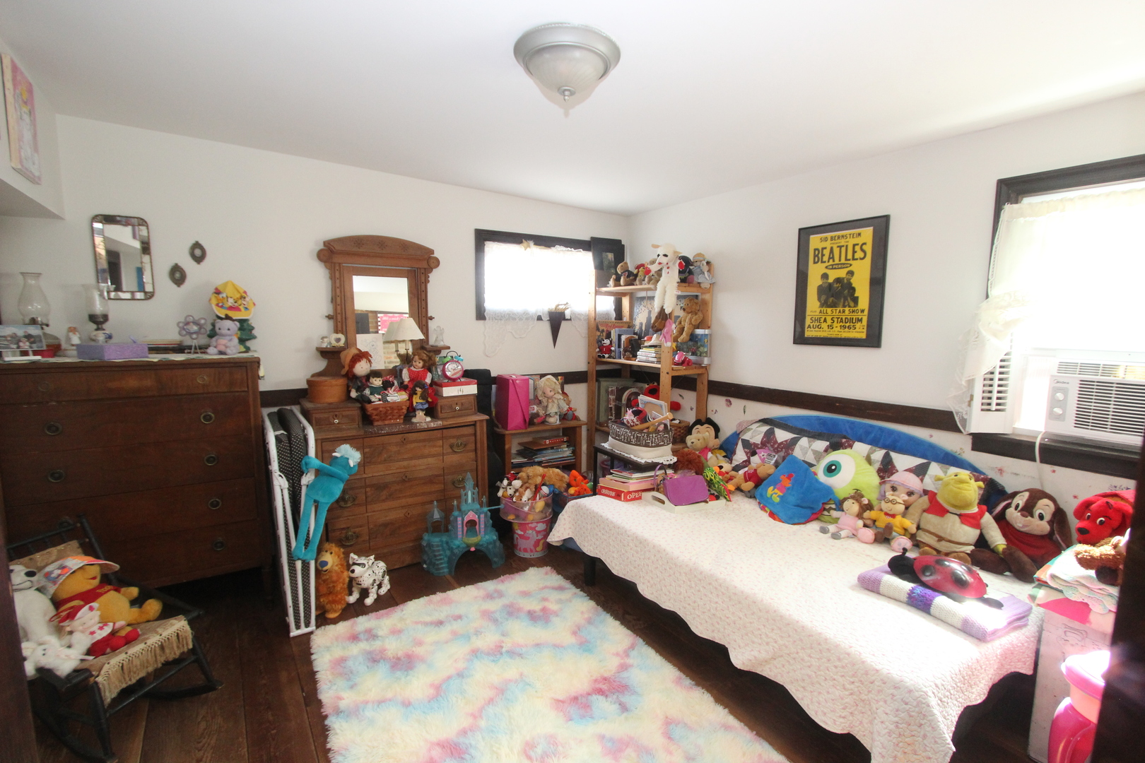 517 Dean Street Woodstock, IL 60098 - Photo 13 of 21 a bedroom with furniture and a couch