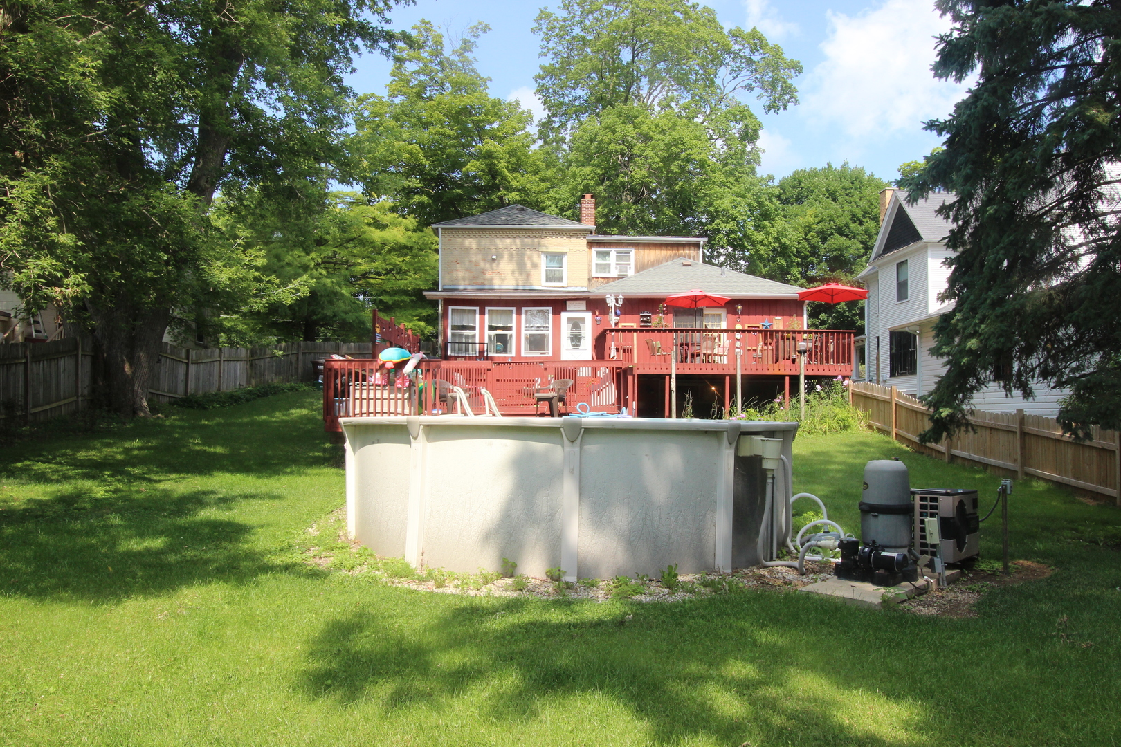 517 Dean Street Woodstock, IL 60098 - Photo 20 of 21 an aerial view of a house with a yard table and chairs