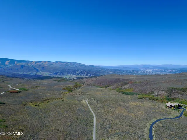a view of lake with mountain