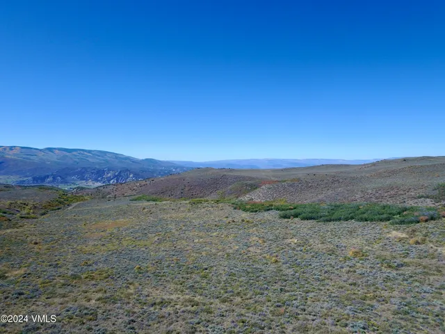 a view of an outdoor space with mountain view