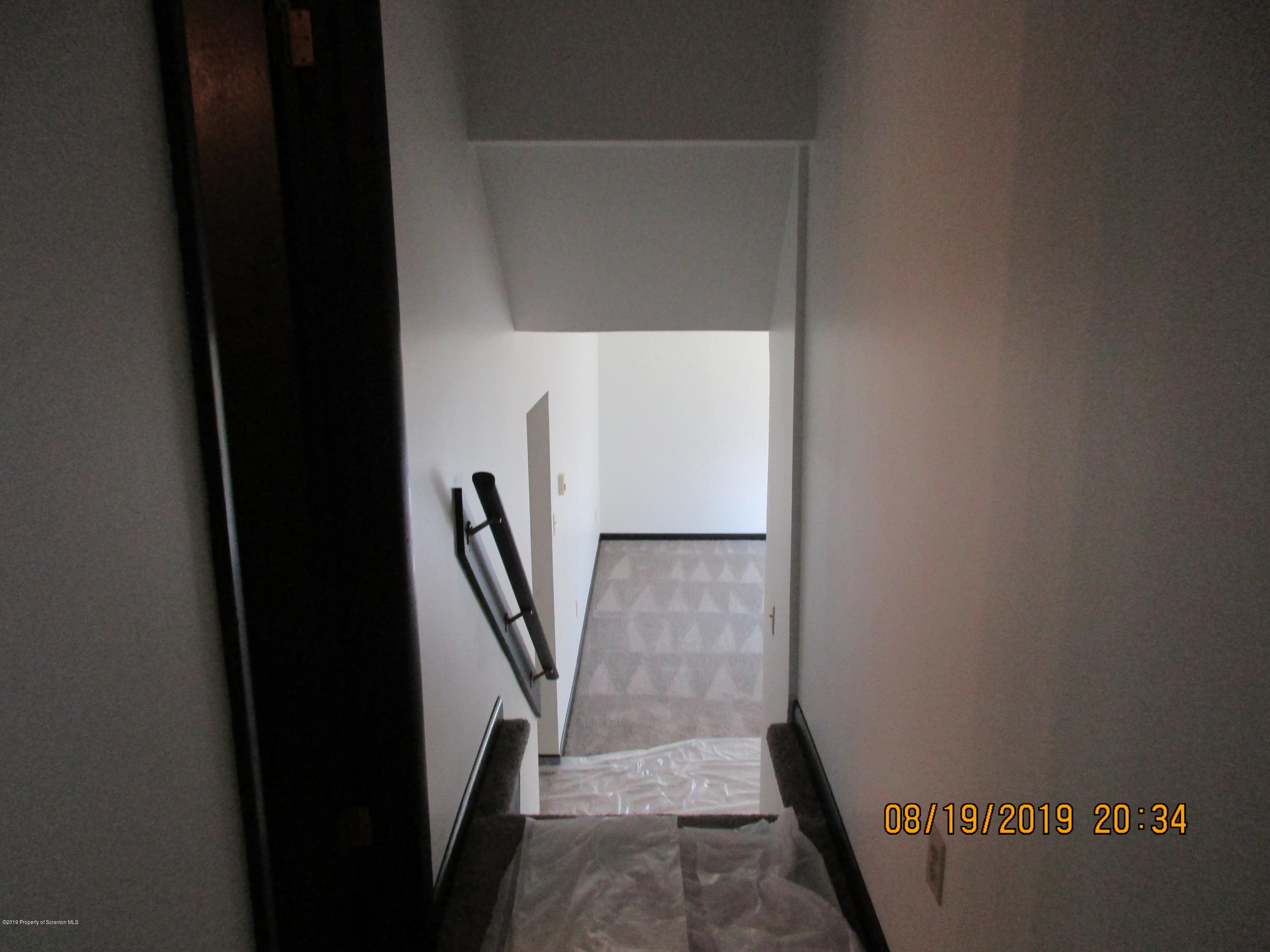 309 Rail Road Nicholson, PA 18446 - Photo 13 of 29 a view of staircase with wooden floor