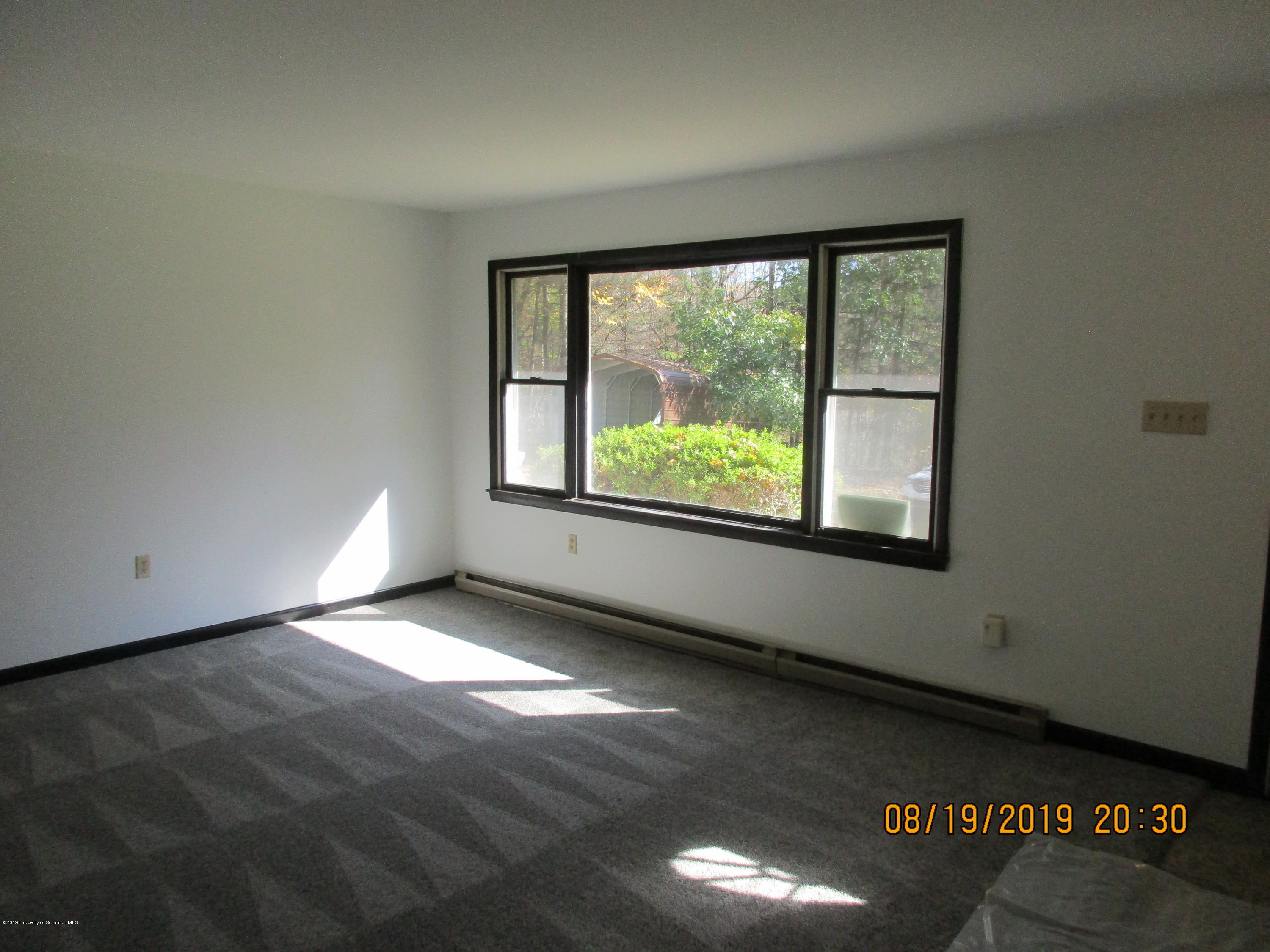309 Rail Road Nicholson, PA 18446 - Photo 5 of 29 a view of an empty room with a window