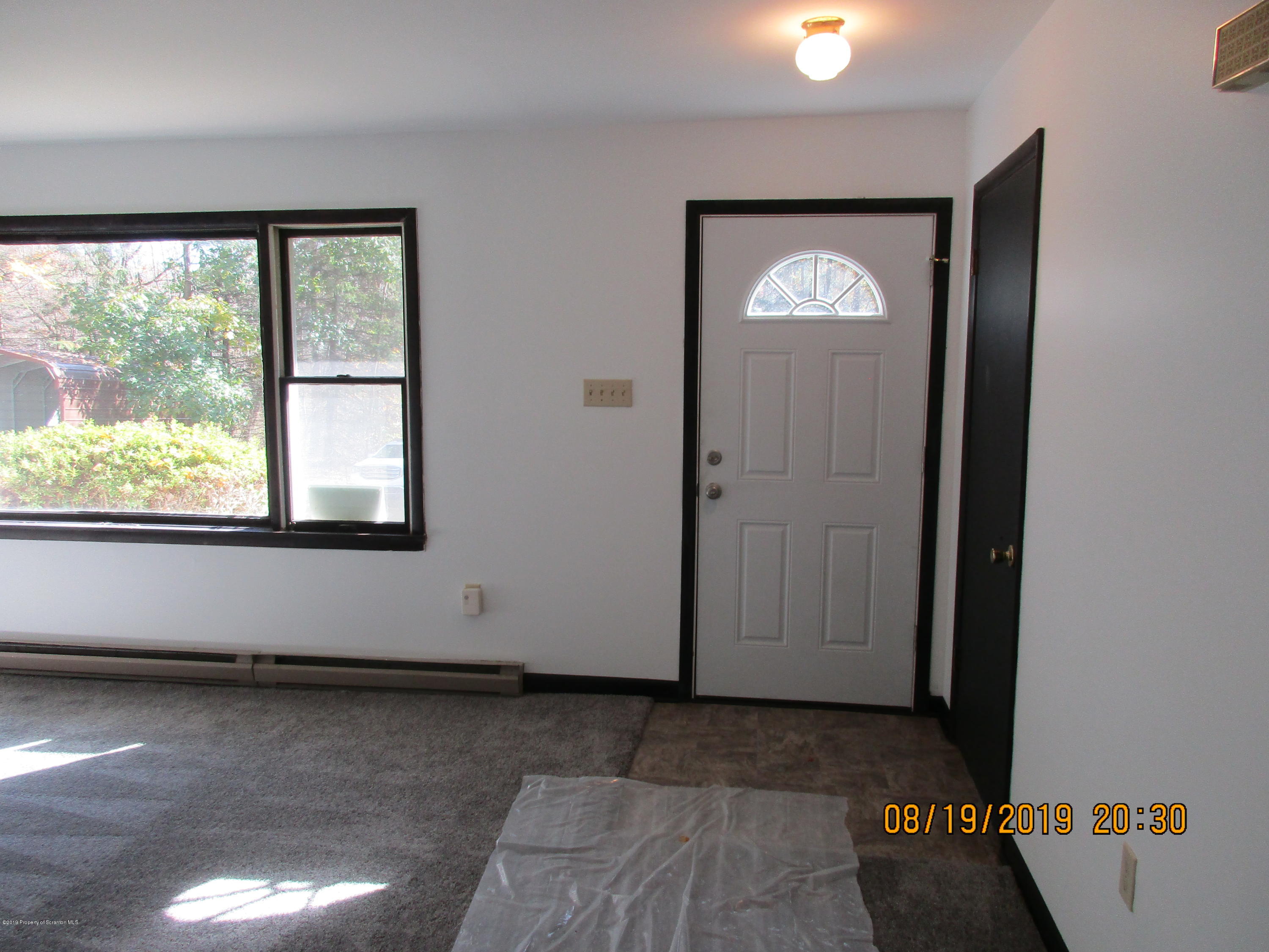 309 Rail Road Nicholson, PA 18446 - Photo 6 of 29 an empty room with a window