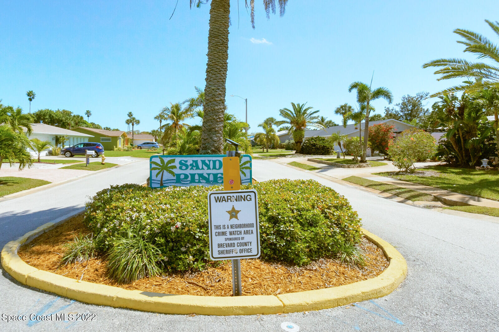 210 Sand Pine Road Indialantic, FL 32903 - Photo 30 of 45 a view of a swimming pool with a yard