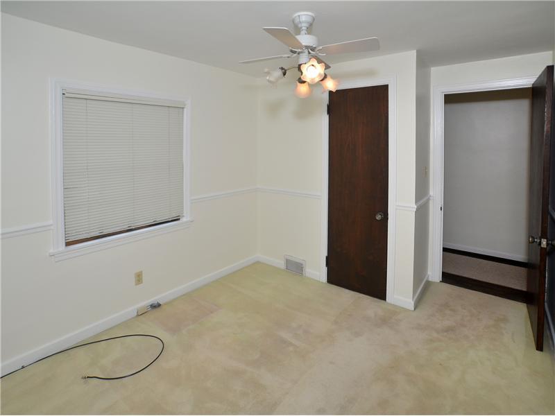 306 Murrysville Road Level Green, PA 15085 - Photo 12 of 21 Bedroom. Bedroom or first floor office. Hardwood floors under carpeting.