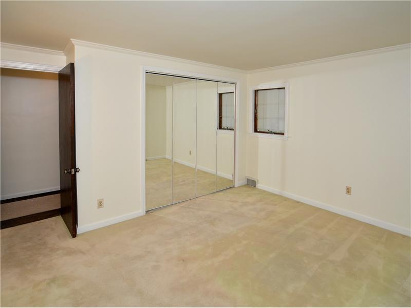 306 Murrysville Road Level Green, PA 15085 - Photo 13 of 21 Master Bedroom. First floor master bedroom. Large closet. Hardwood floors under carpeting.