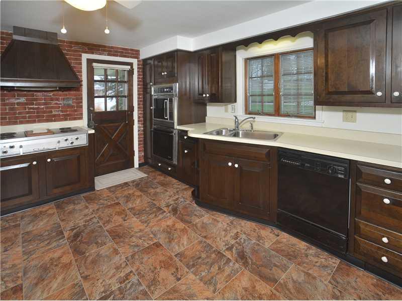 306 Murrysville Road Level Green, PA 15085 - Photo 5 of 21 Kitchen. Nice kitchen with access to back covered patio for grilling. All appliances included.