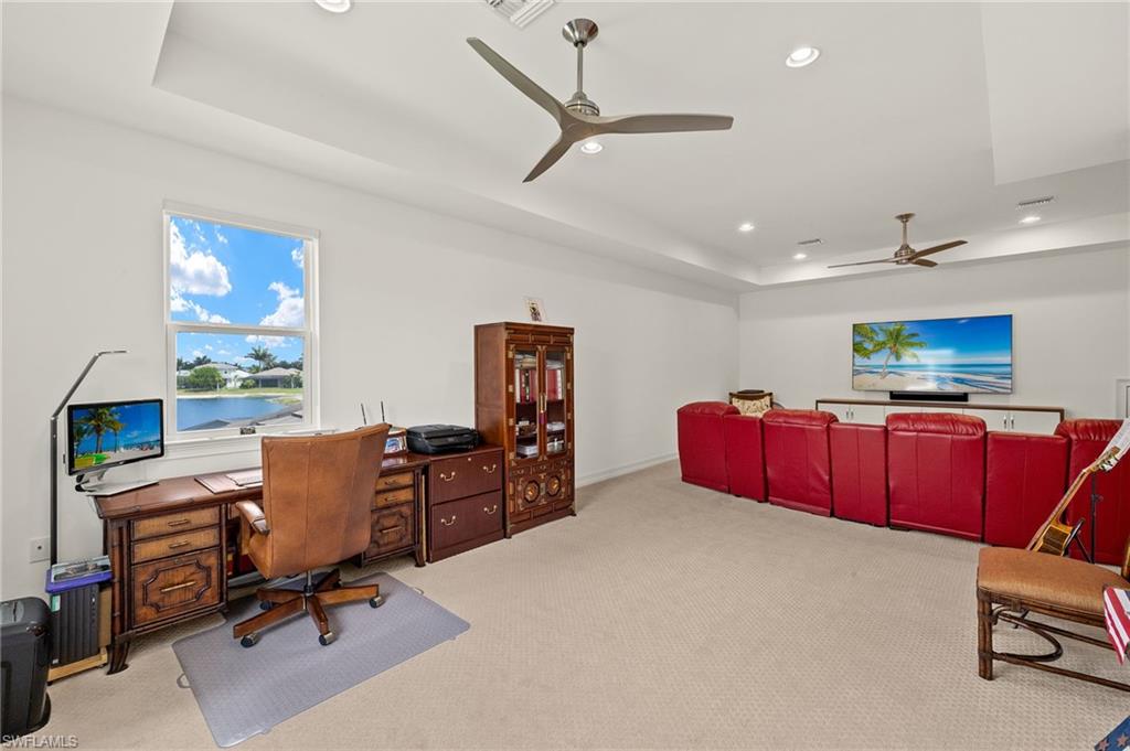 14809 Windward Lane Naples, FL 34114 - Photo 16 of 50 a room with furniture