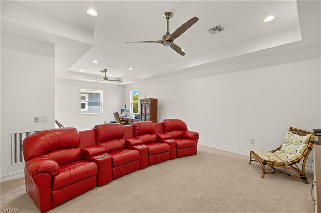 14809 Windward Lane Naples, FL 34114 - Photo 17 of 50 a living room with furniture and a window