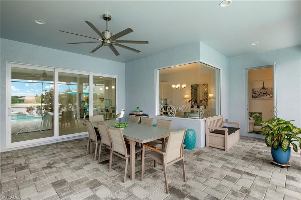 14809 Windward Lane Naples, FL 34114 - Photo 36 of 50 a view of a dining room with furniture window and outside view