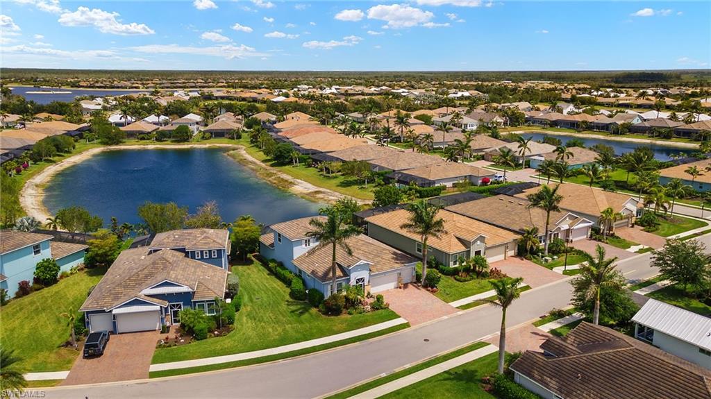 14809 Windward Lane Naples, FL 34114 - Photo 42 of 50 an aerial view of residential houses with outdoor space