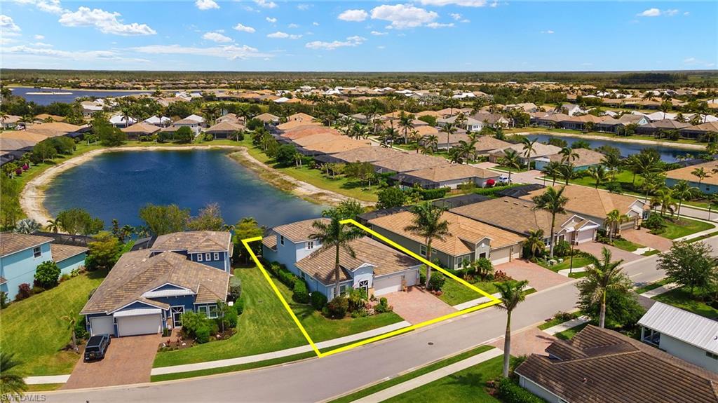14809 Windward Lane Naples, FL 34114 - Photo 43 of 50 an aerial view of residential houses with outdoor space