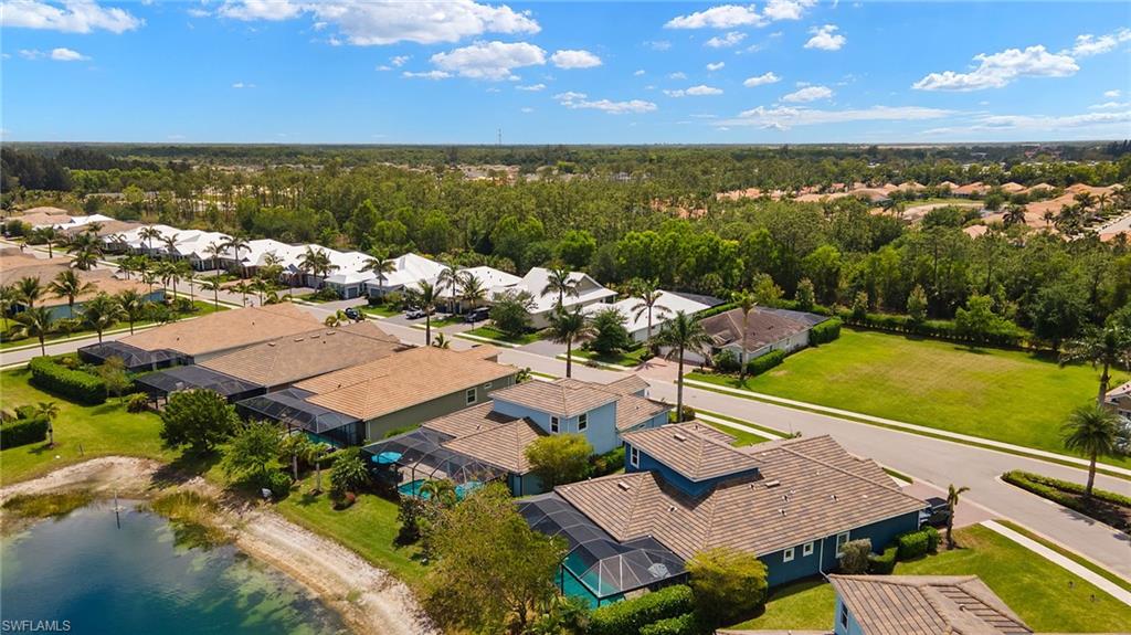 14809 Windward Lane Naples, FL 34114 - Photo 46 of 50 a view of a city from a terrace