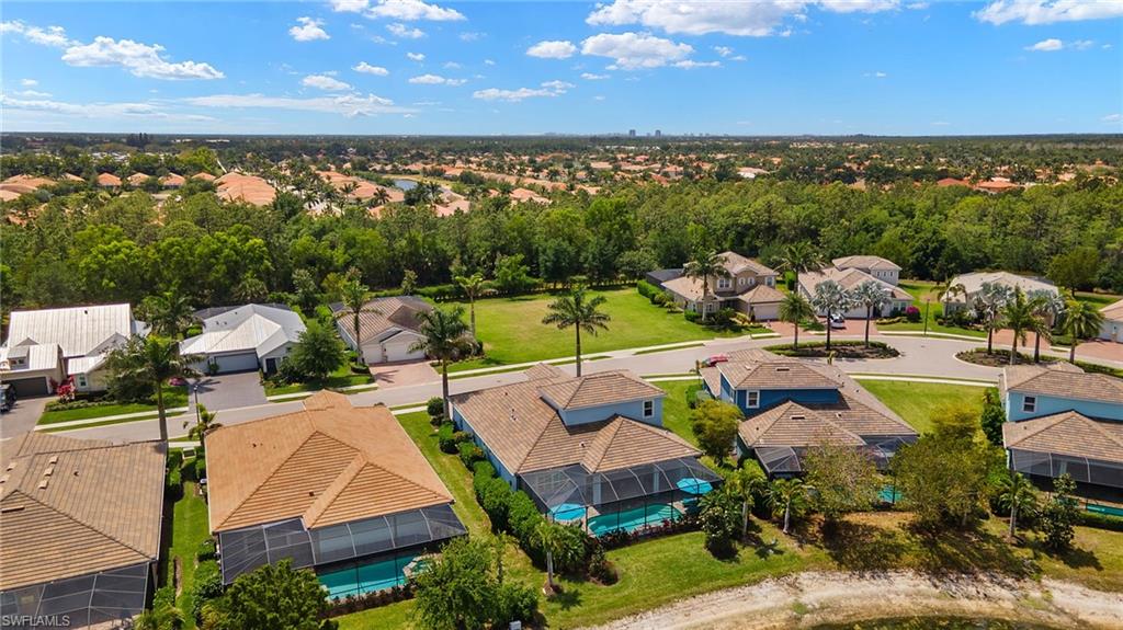 14809 Windward Lane Naples, FL 34114 - Photo 47 of 50 an aerial view of tennis court