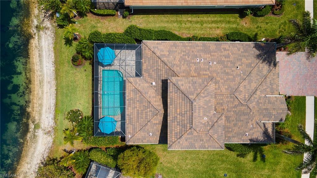 14809 Windward Lane Naples, FL 34114 - Photo 49 of 50 a view of outdoor space yard and patio