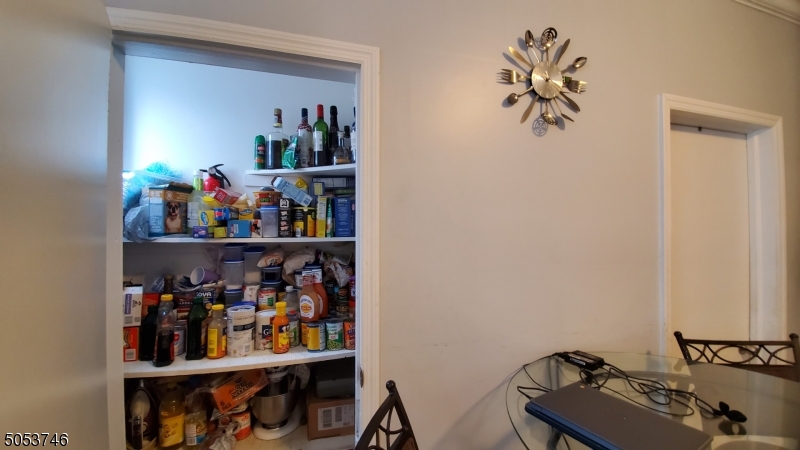 34 Olive Street, Unit 2 Bloomfield, NJ 07003 - Photo 13 of 19 a room with wine cabinets and a window