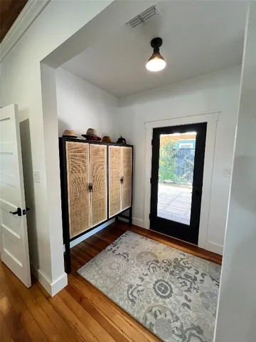 a view of an empty room and window