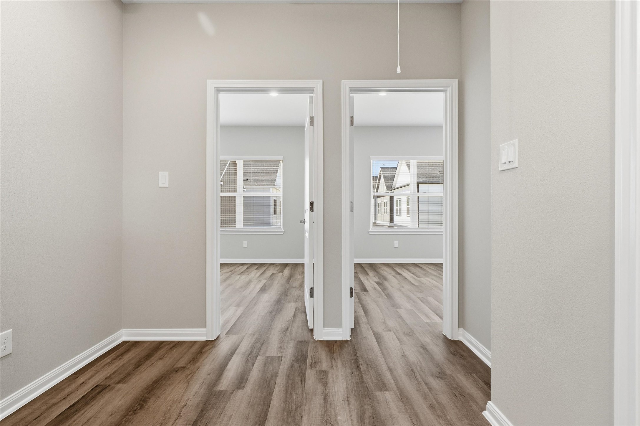 209 Clark Meadows Lane Houston, TX 77076 - Photo 27 of 50 view of hallway with wooden floor