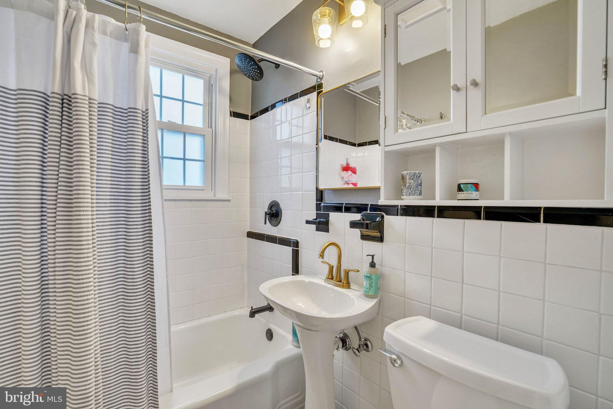 1901 Scroggins Road Alexandria, VA 22302 - Photo 15 of 38 Chic bathroom with modern accents.