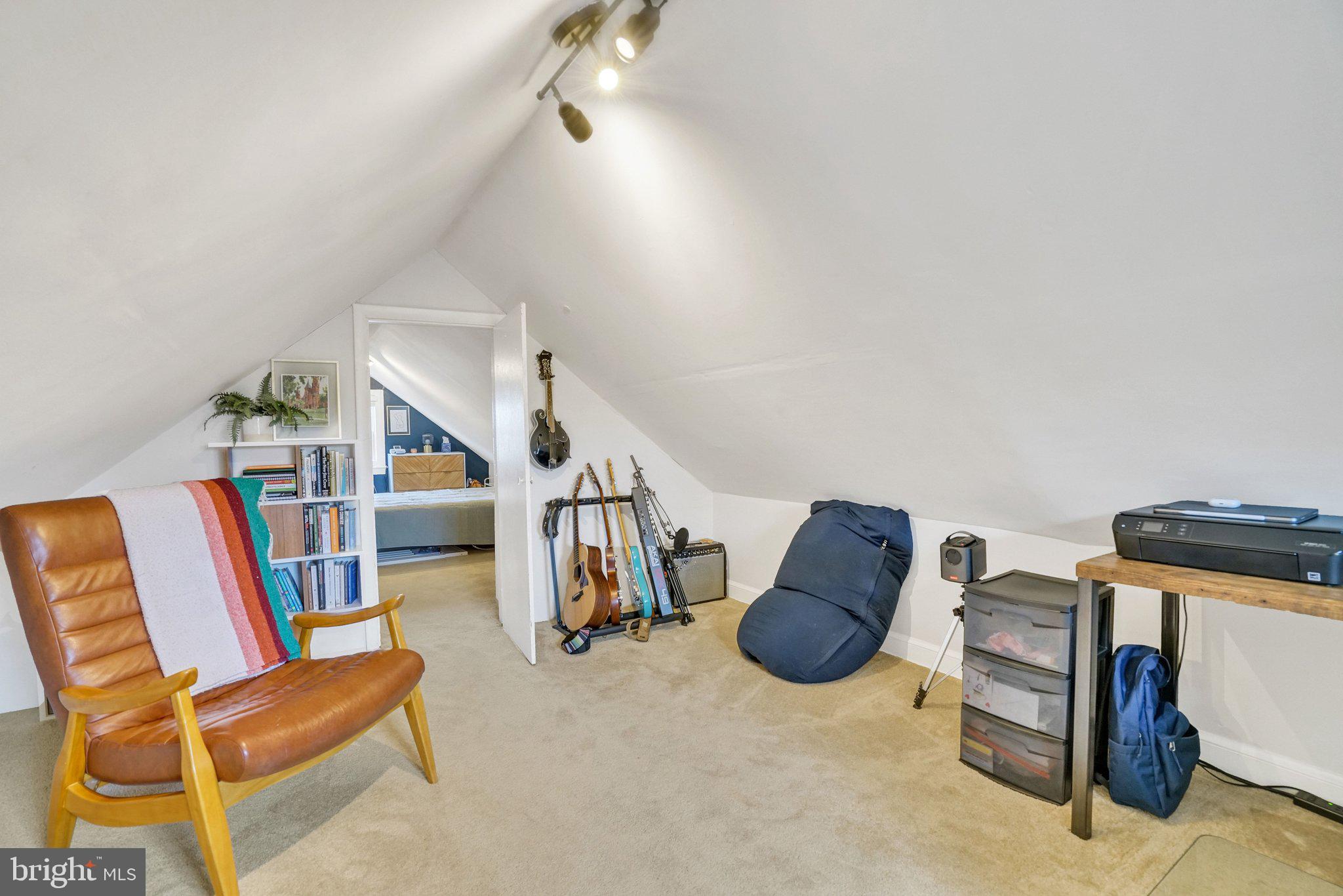 1901 Scroggins Road Alexandria, VA 22302 - Photo 23 of 38 Cozy attic retreat with creative vibes.