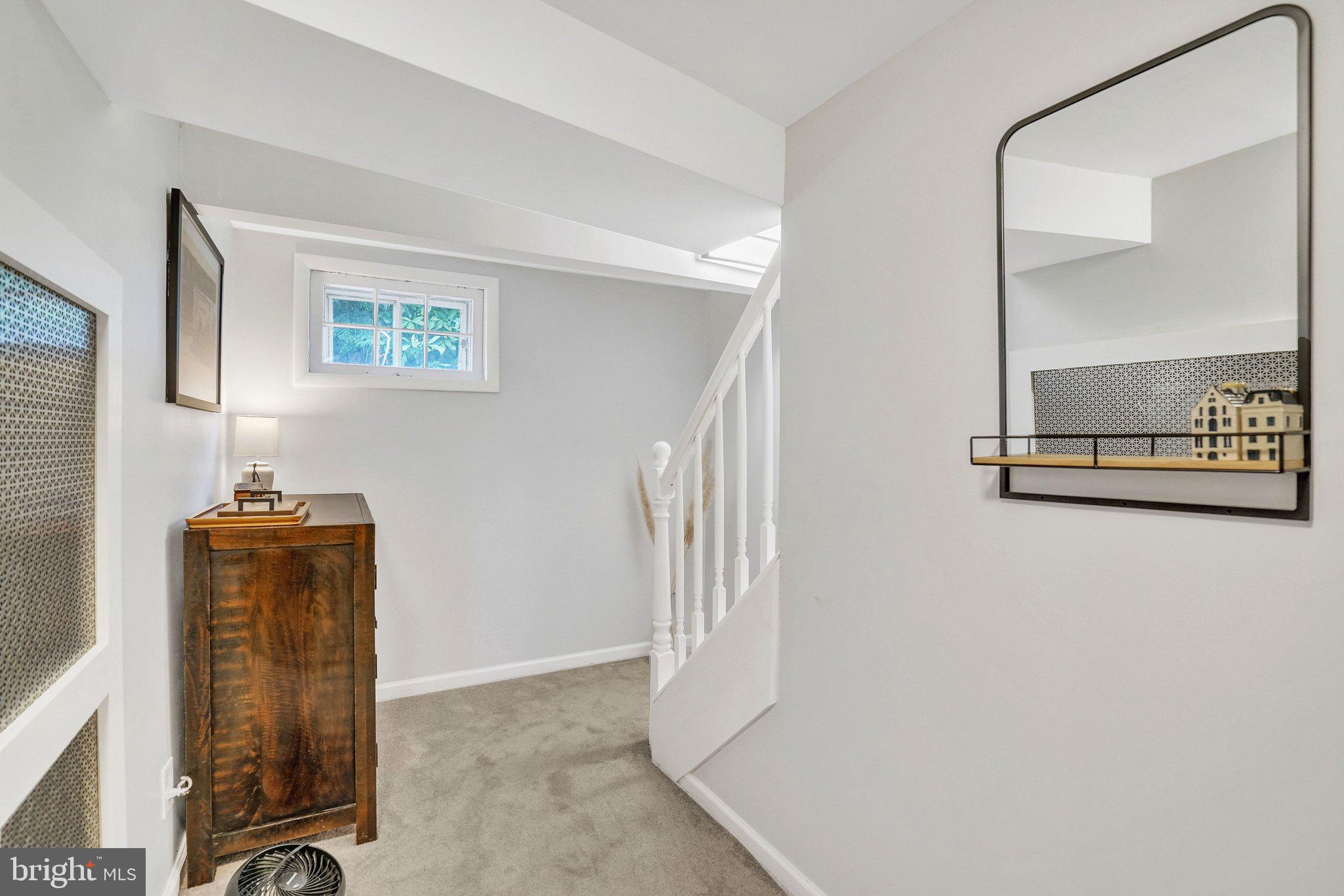 1901 Scroggins Road Alexandria, VA 22302 - Photo 24 of 38 Inviting staircase with natural light.