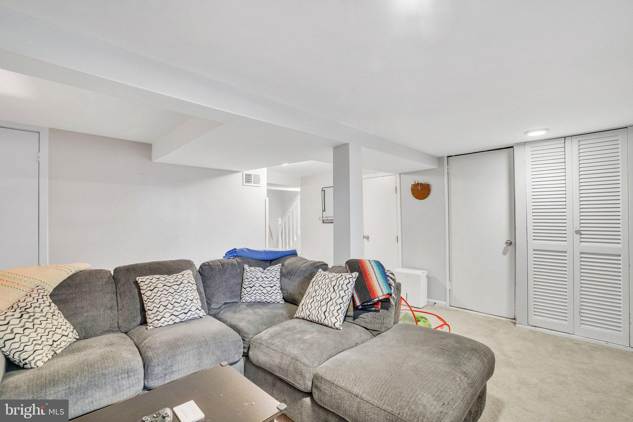 1901 Scroggins Road Alexandria, VA 22302 - Photo 26 of 38 Spacious, inviting basement retreat.